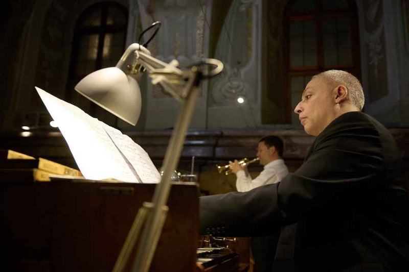 Audience member listening to classical music in Capuchin Church